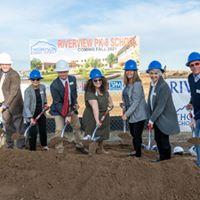 Board of Education with shovels 